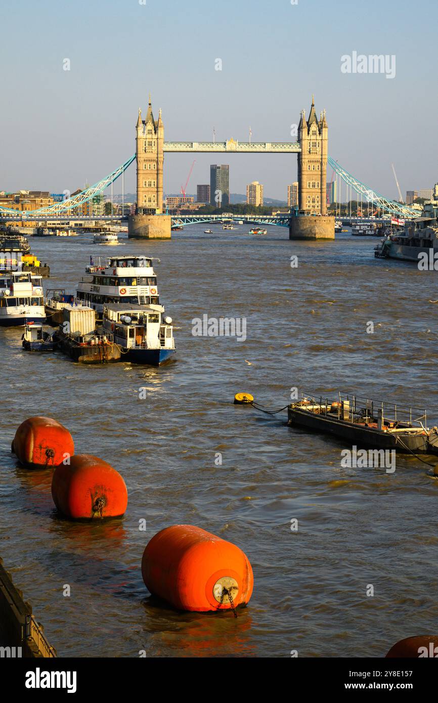 London, UK - September 19, 2024; Tower Bridge and large orange bouys on River Thames in London Stock Photo