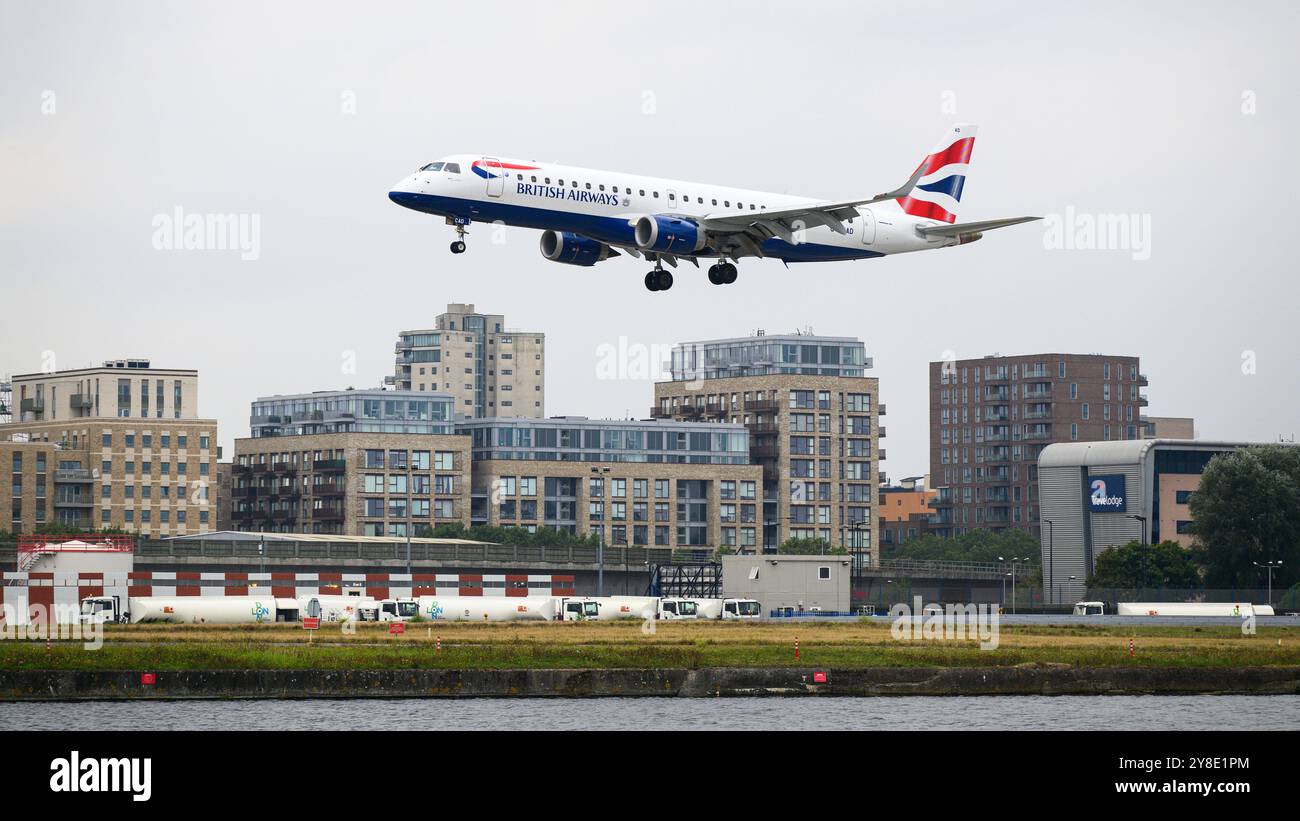 London, UK - September 21, 2024; British Airways BA CityFlyer ERJ-190 passenger aircraft landing at London City Airport LCY Stock Photo