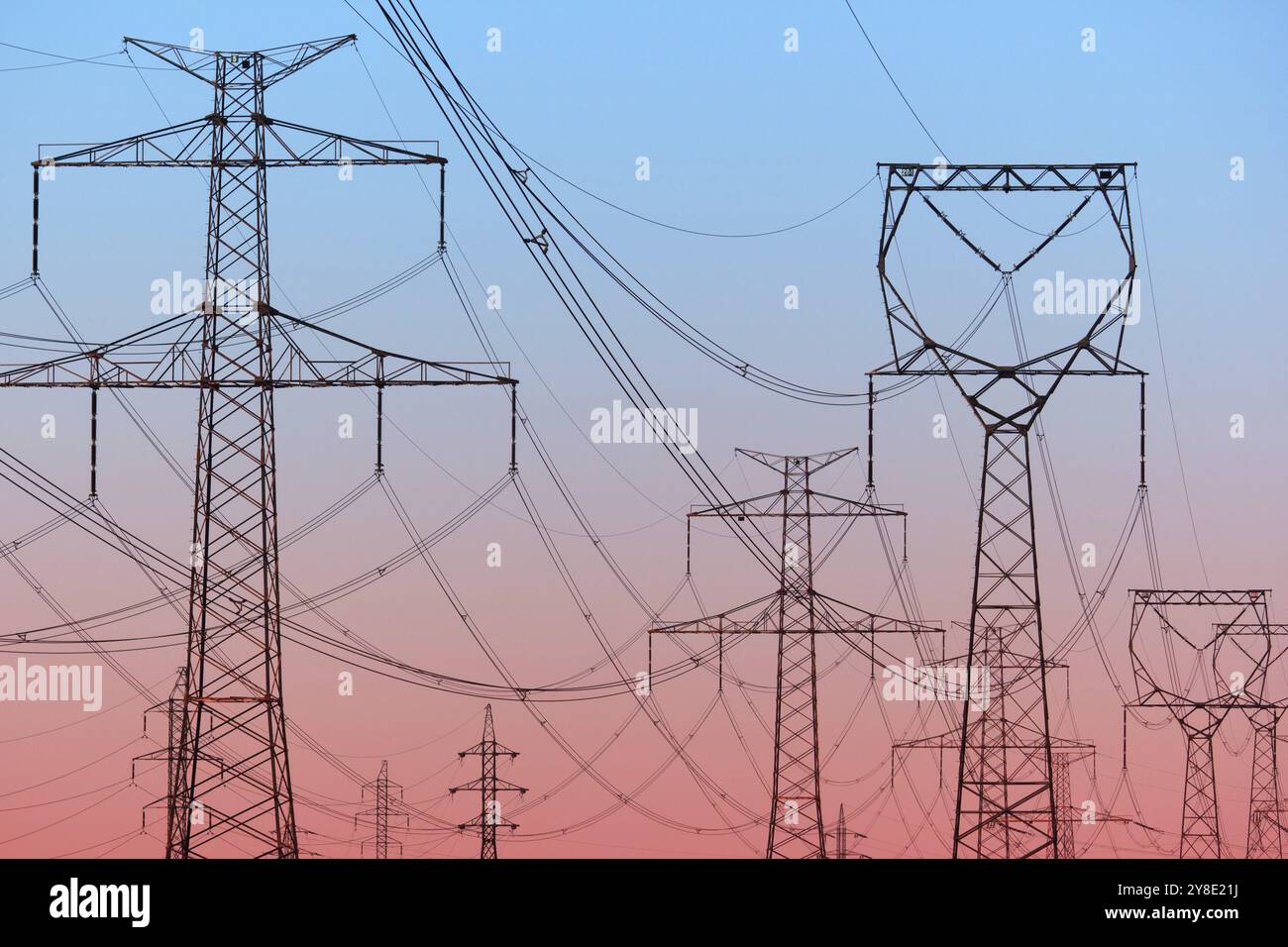 Power lines on evening sky Stock Photo - Alamy