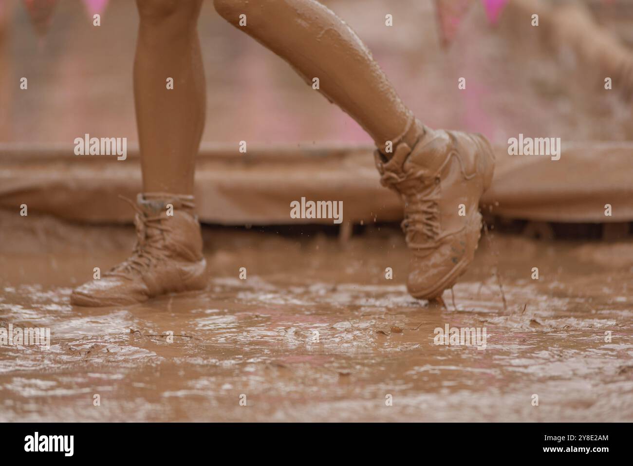 Shoes in the mud during a dynamic outdoor obstacle course Stock Photo ...