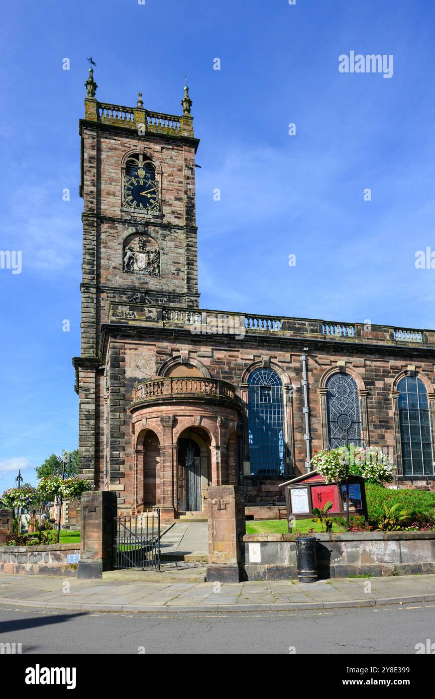 Whitchurch, Shropshire, UK - September 16, 2024; St Alkmunds parish church in North Shropshire with gate and tower Stock Photo