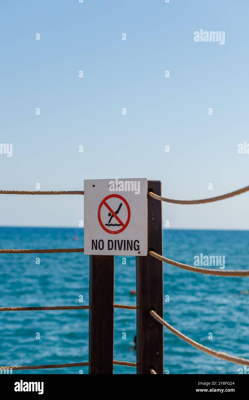 Signboard warning prohibited swimming hi-res stock photography and ...