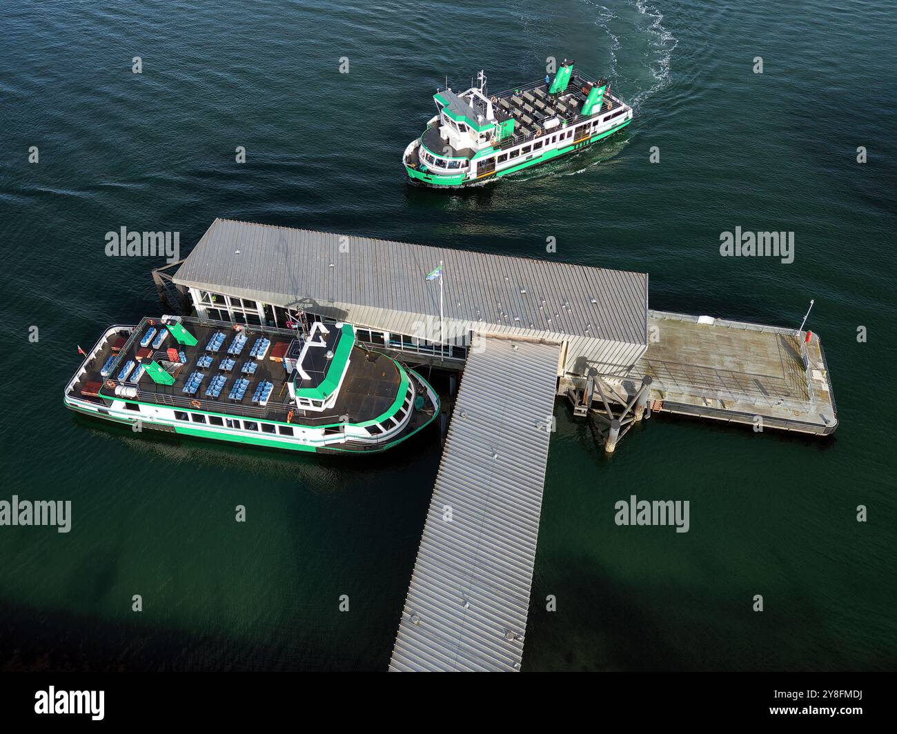 An aerial view of the passenger ferries Harbour Spirit and Spirit of Gosport at the Gosport pontoon in Portsmouth Harbour. Stock Photo