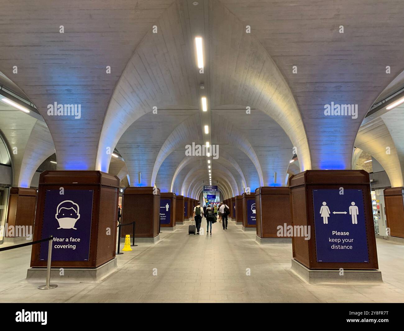 Covid 19 instructions, London Bridge Railway station, London - Smartphone Captured Stock Image