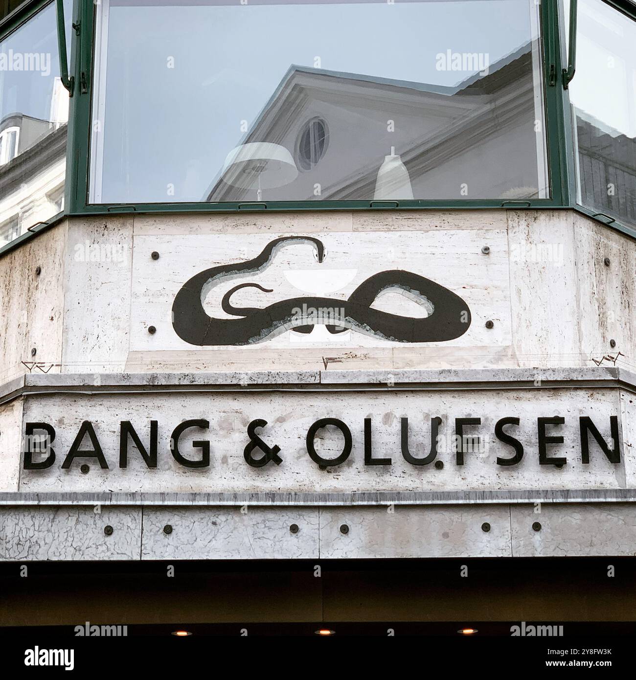 Art Deco tiled animals on facade of Bang and Olufsen showroom at Østergade 18, Copenhagen, Denmark. - Smartphone Captured Stock Image