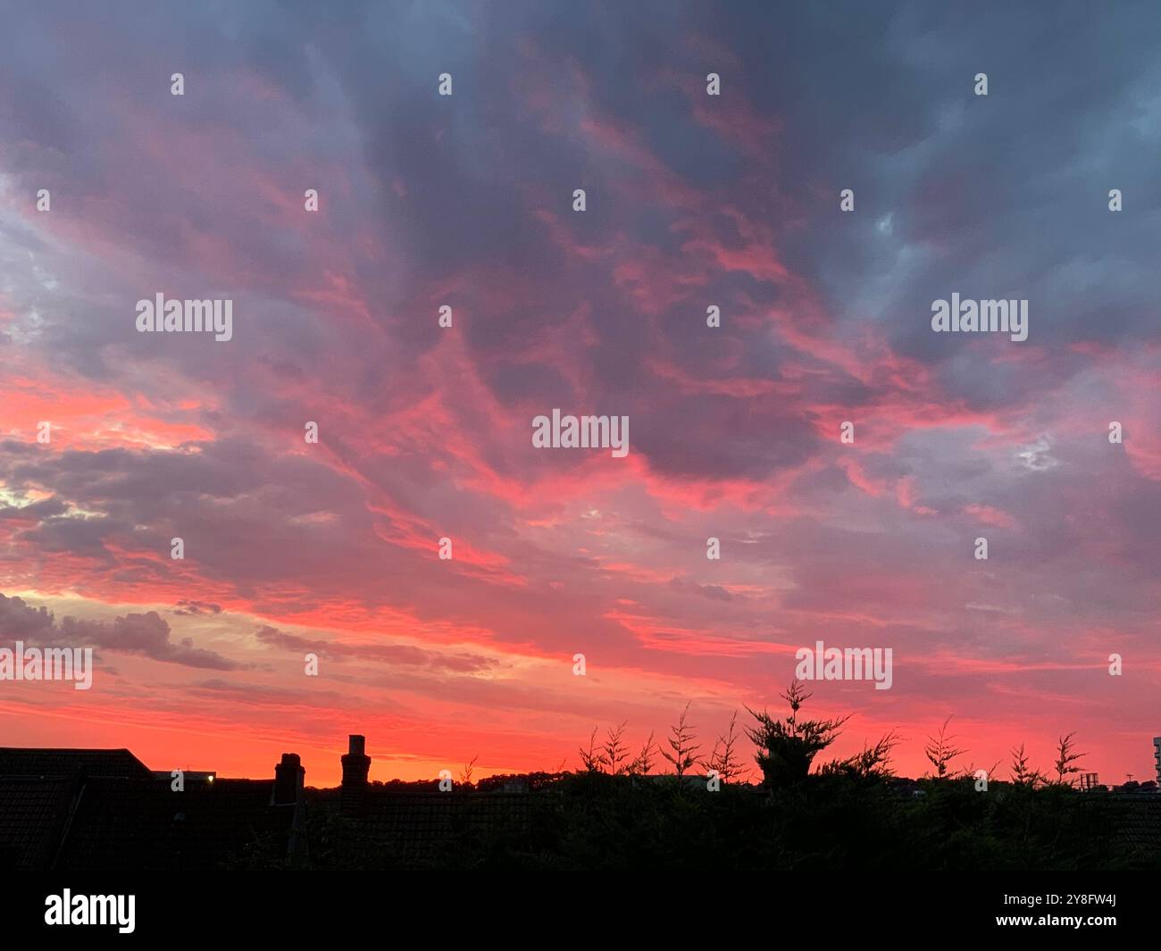 deep red evening sky, London, U.K. - Smartphone Captured Stock Image