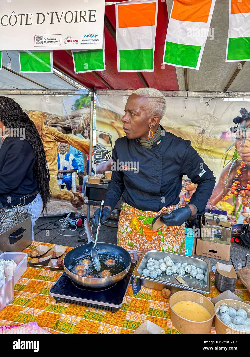 Paris, France, Ivory Coast, Women, Street Food,  Exotic Food at International Food Street Festival, "Marché des Cuisines du Monde", Workers Stock Photo