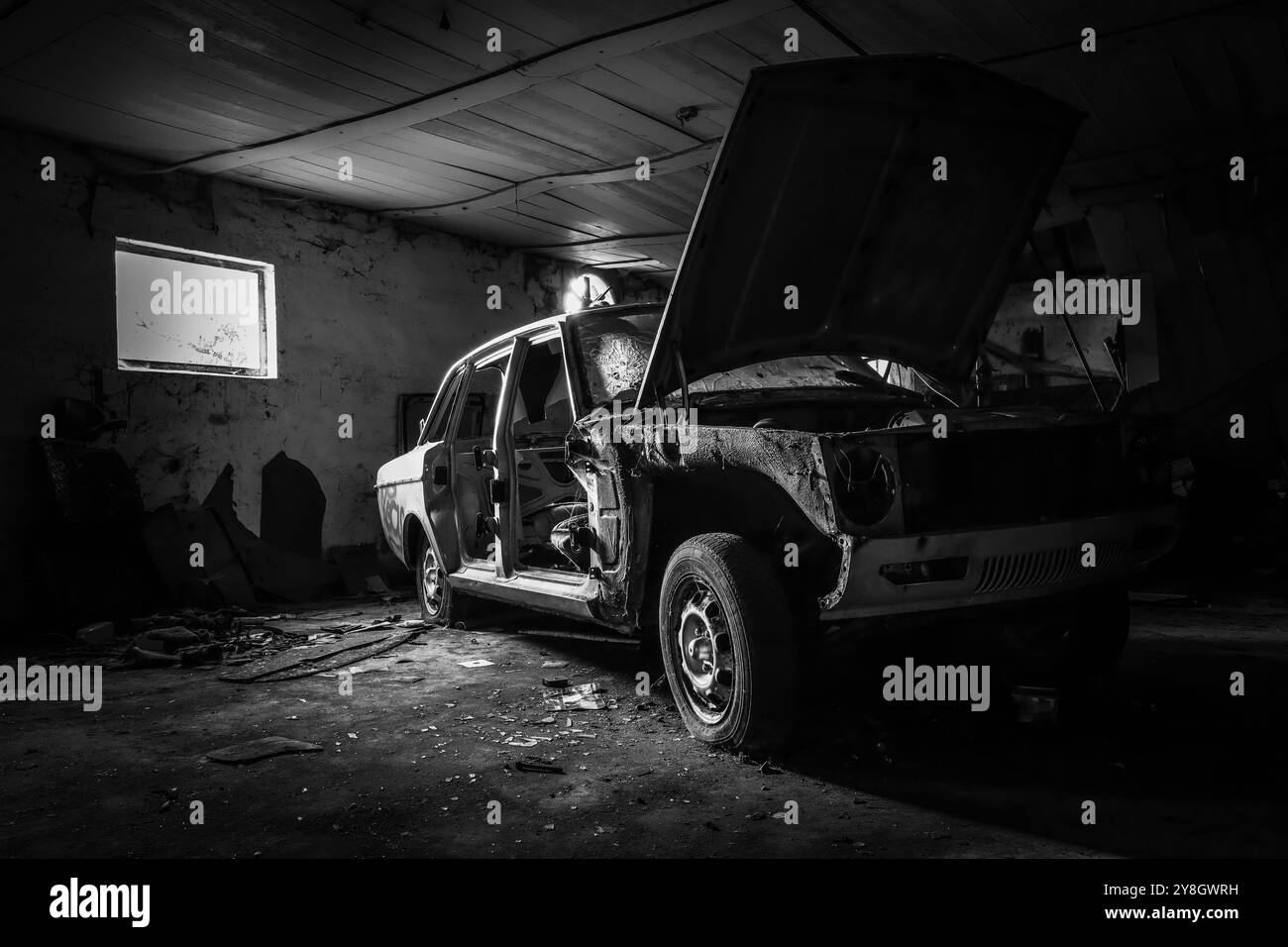 broken car wreck with open hood Stock Photo