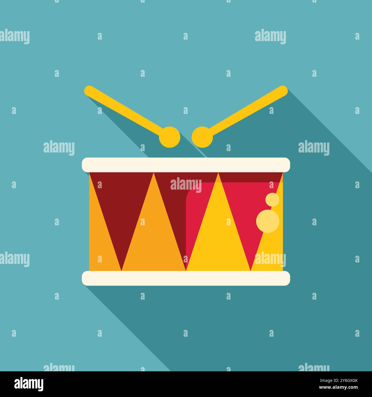Colorful toy drum with drumsticks is lying on a blue background ...