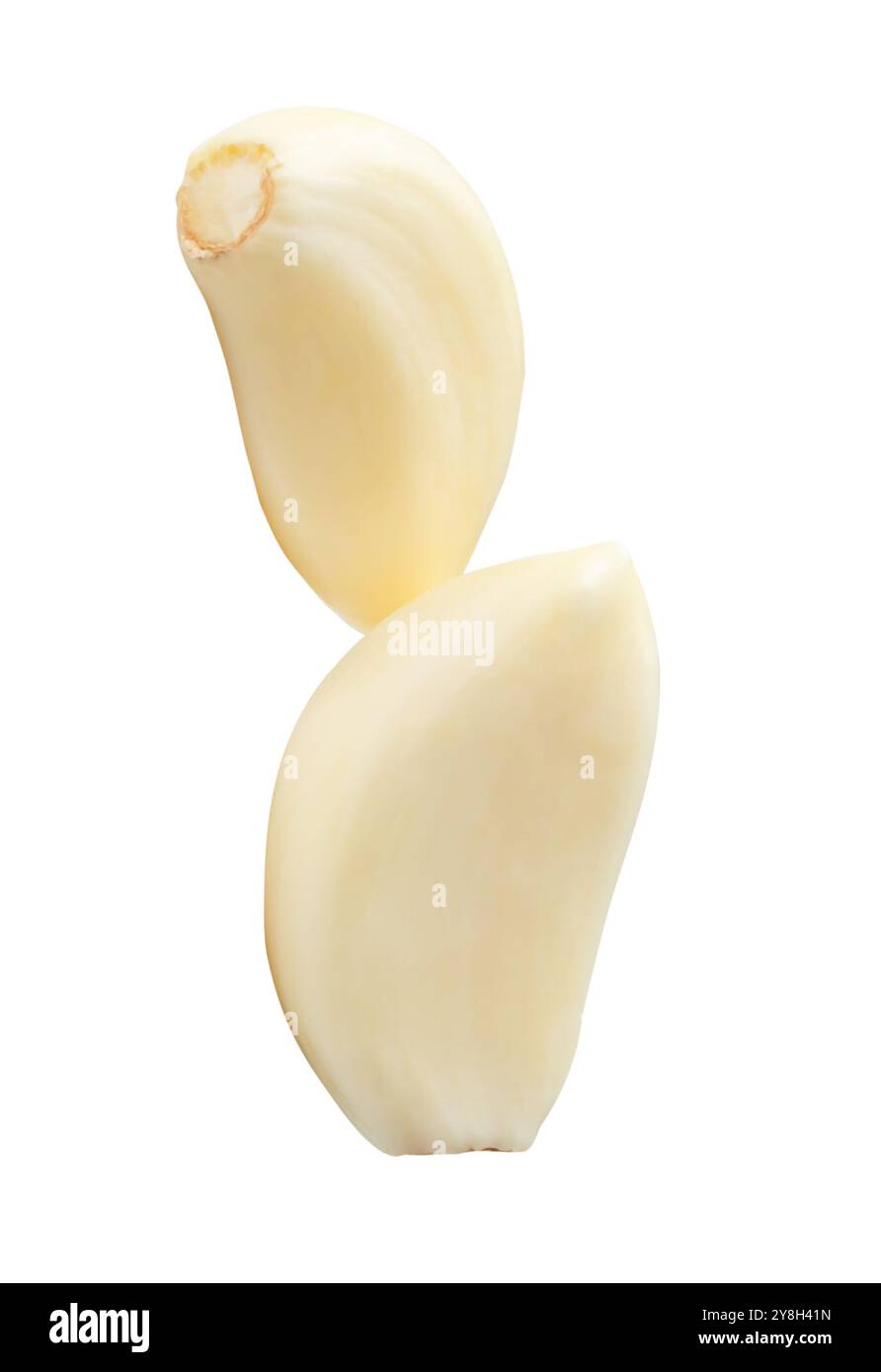 Peeled garlic cloves in stack are isolated on white background with ...