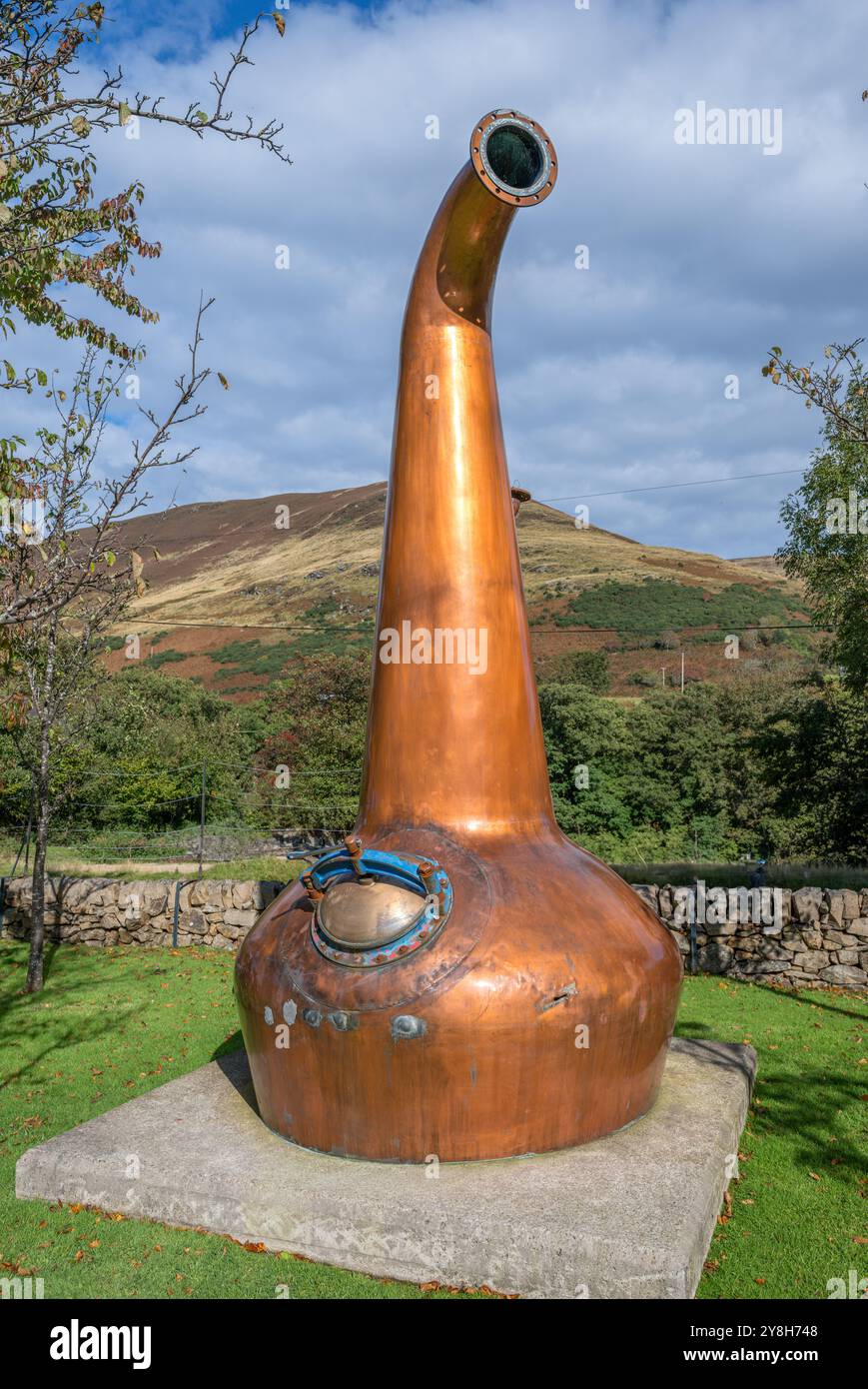 Pot still outside the Lochranza distillery, Lochranza, Isle of Arran, Scotland,  UK Stock Photo