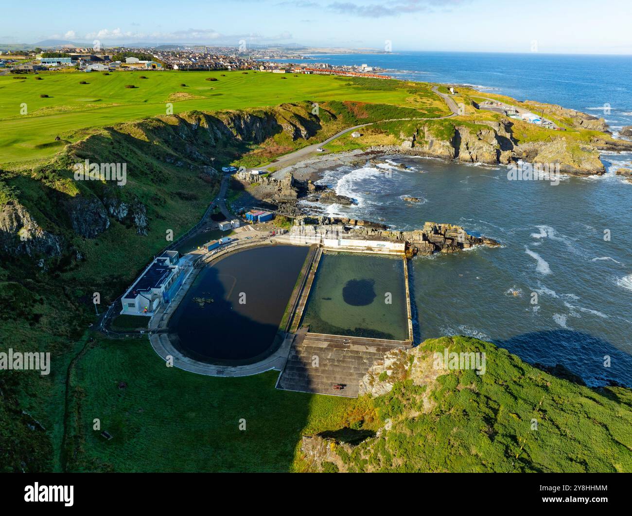 Aerial view from drone of outdoor swimming pools at Tarlair, Macduff, on Moray coast  in Aberdeenshire Scotland, UK Stock Photo