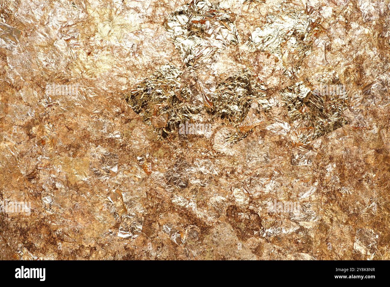 Gold leaf texture or background. Texture of the gold leaf gilded on buddha. Stock Photo