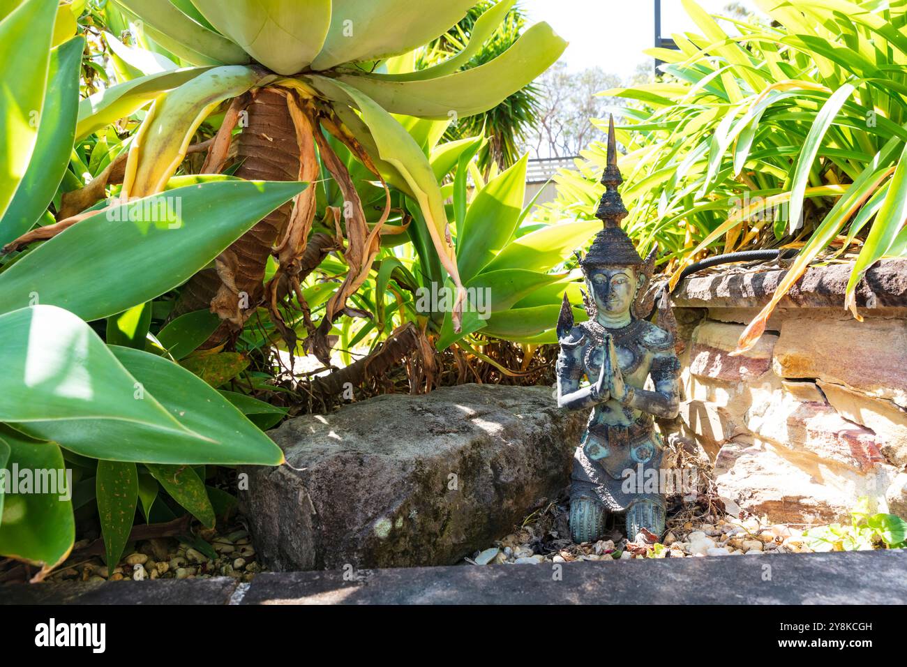 Photograph of a small Thai Buddha statue in a meditation pose located ...