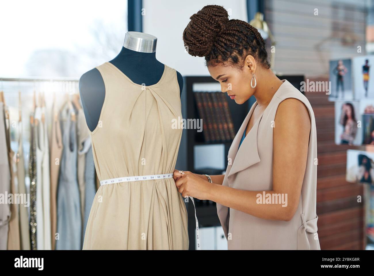 Tape measure, fashion designer and woman in workshop with mannequin for ...