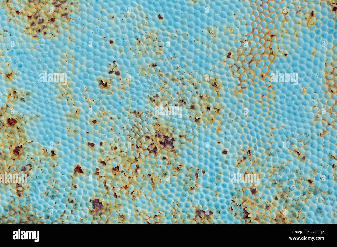 Rusty metal texture close up background with stains and dotty pattern Stock Photo