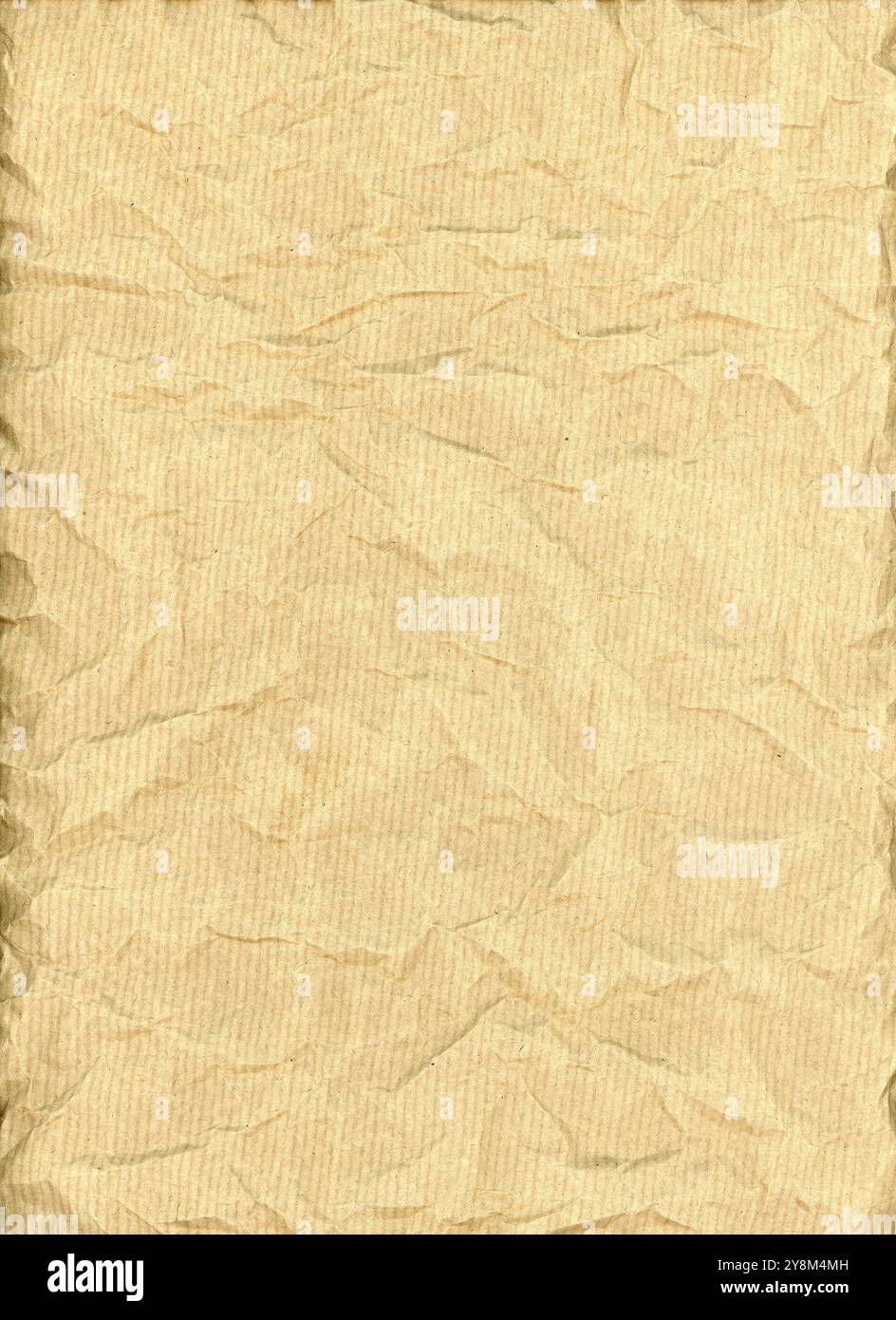 Crumpled brown parcel wrapping kraft paper textured background Stock Photo