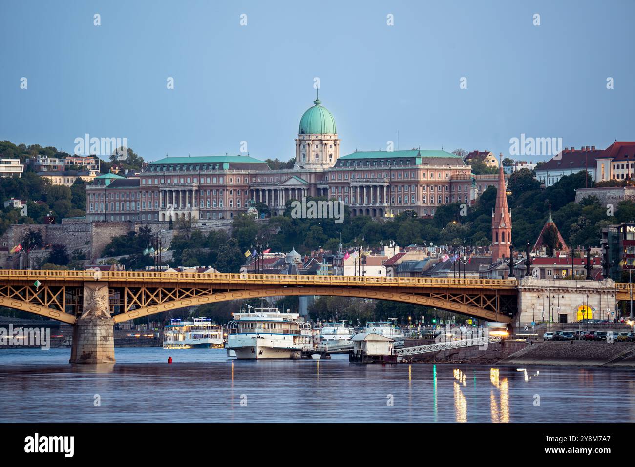 Buda castle, royal palace with Margit bridge and ships in the Danube ...