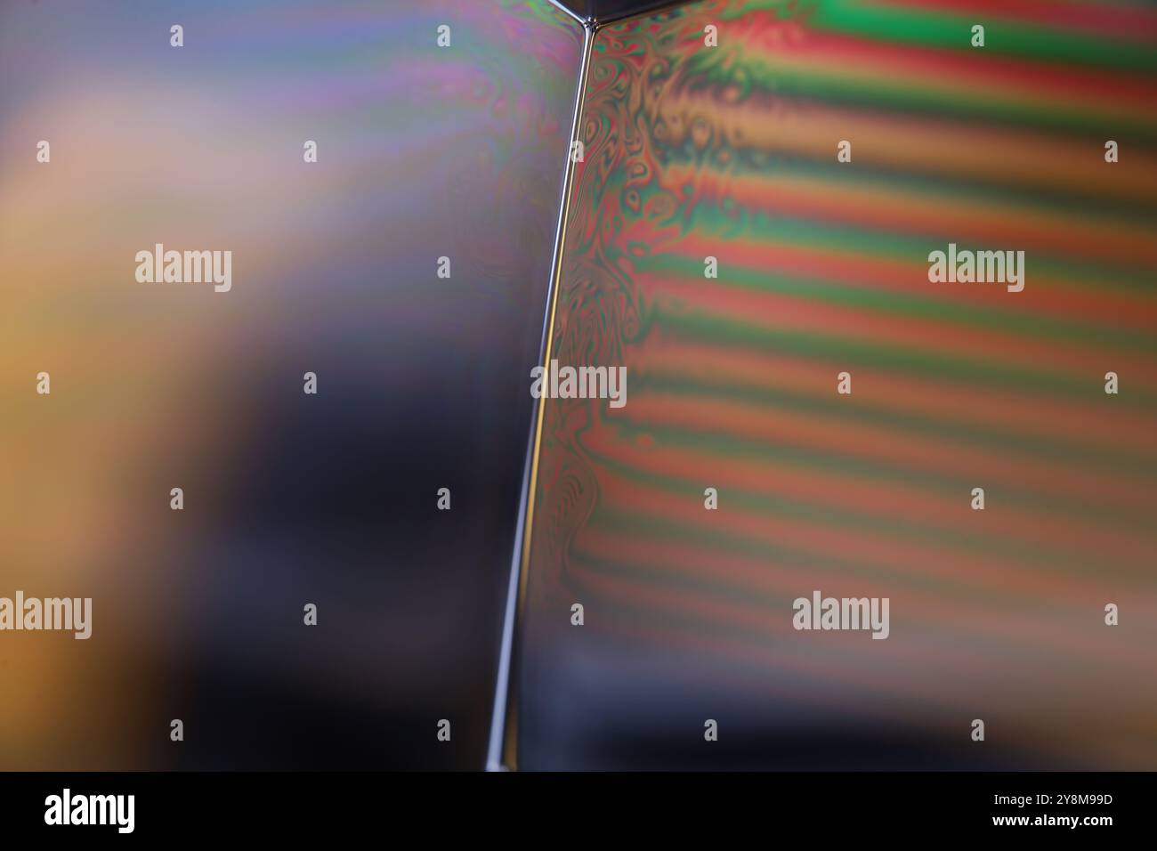Connection of Green liquid bubbles, oil texture, gasoline in macro Stock Photo