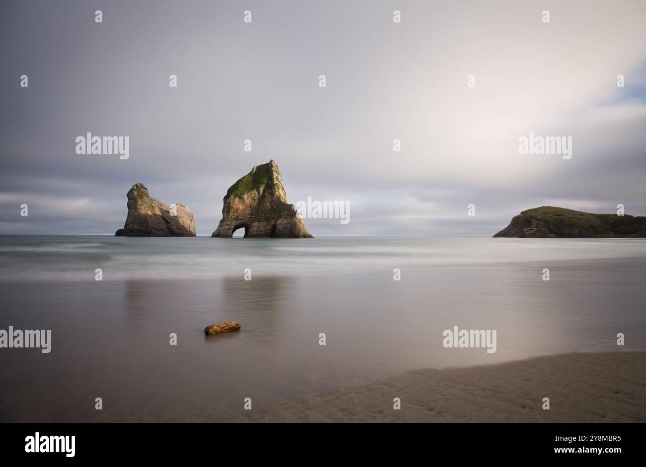 Spit With Rocks Farewell Spit New Zealand beach Rock haystacks Stock Photo - Alamy