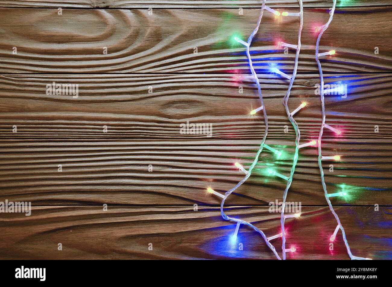Christmas lights on dark wooden background flat lay mockup frame for ...