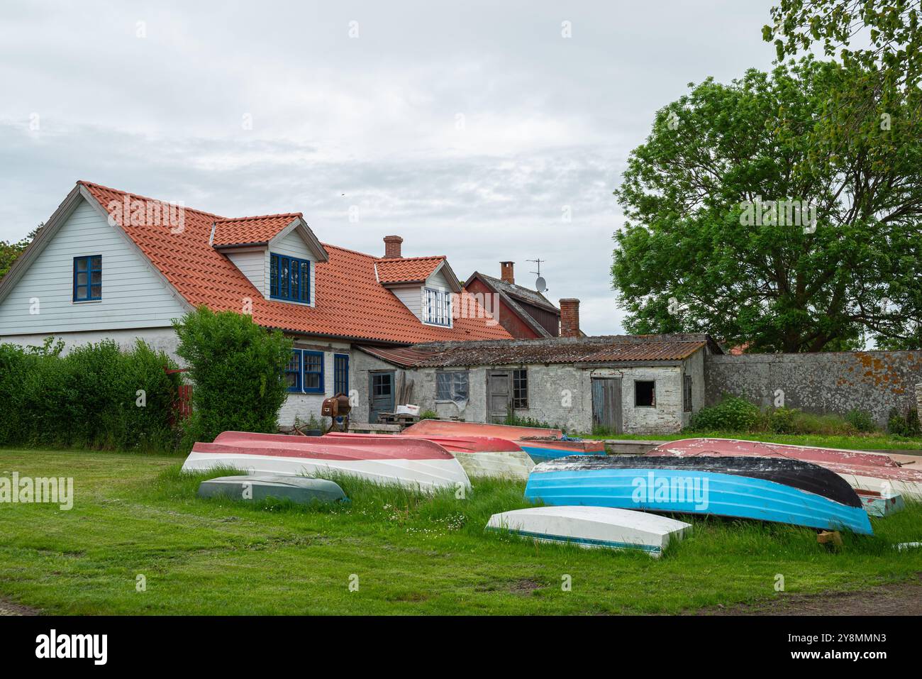 Houses and boats on island of Nyord in Denmark Stock Photo