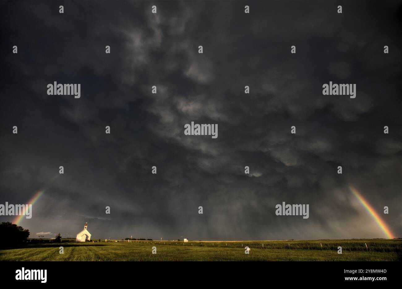 Old Country Church in Saskatchewan Canada with storm clouds rainbow ...
