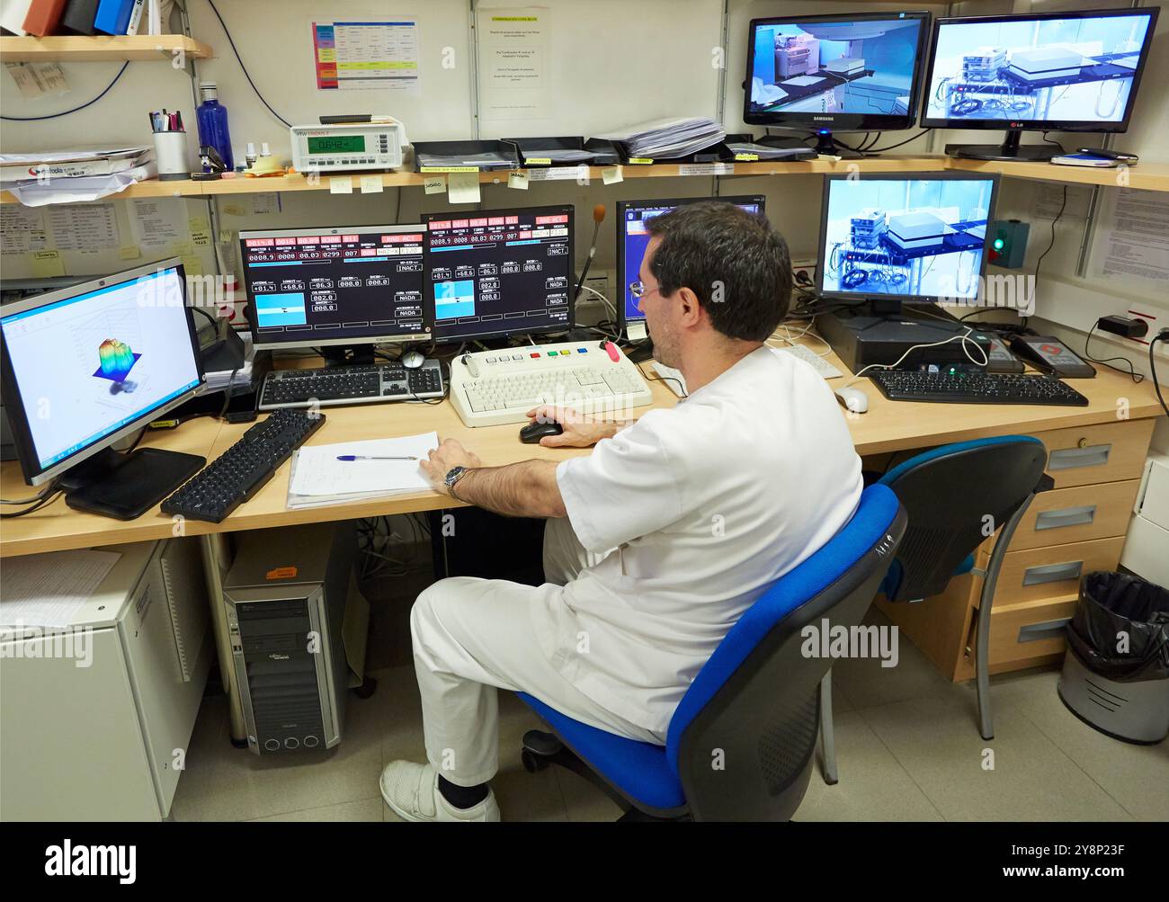 Mri Machine Control Panel Doctor reviewing MRI scans. Control screens, Linear Particle ...