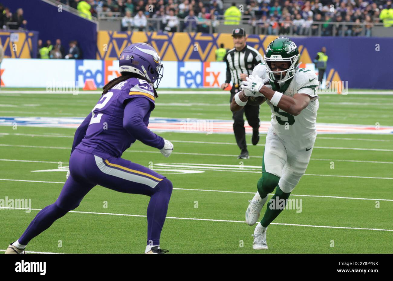 London, UK. 06th Oct, 2024. New York Jets Wide Receiver Garrett Wilson runs with the football in their game against the Minnesota Vikings at White Hart Lane in London on Sunday, October 06, 2024. Vikings beat the Jets 23-17. Photo by Hugo Philpott/UPI Credit: UPI/Alamy Live News Stock Photo