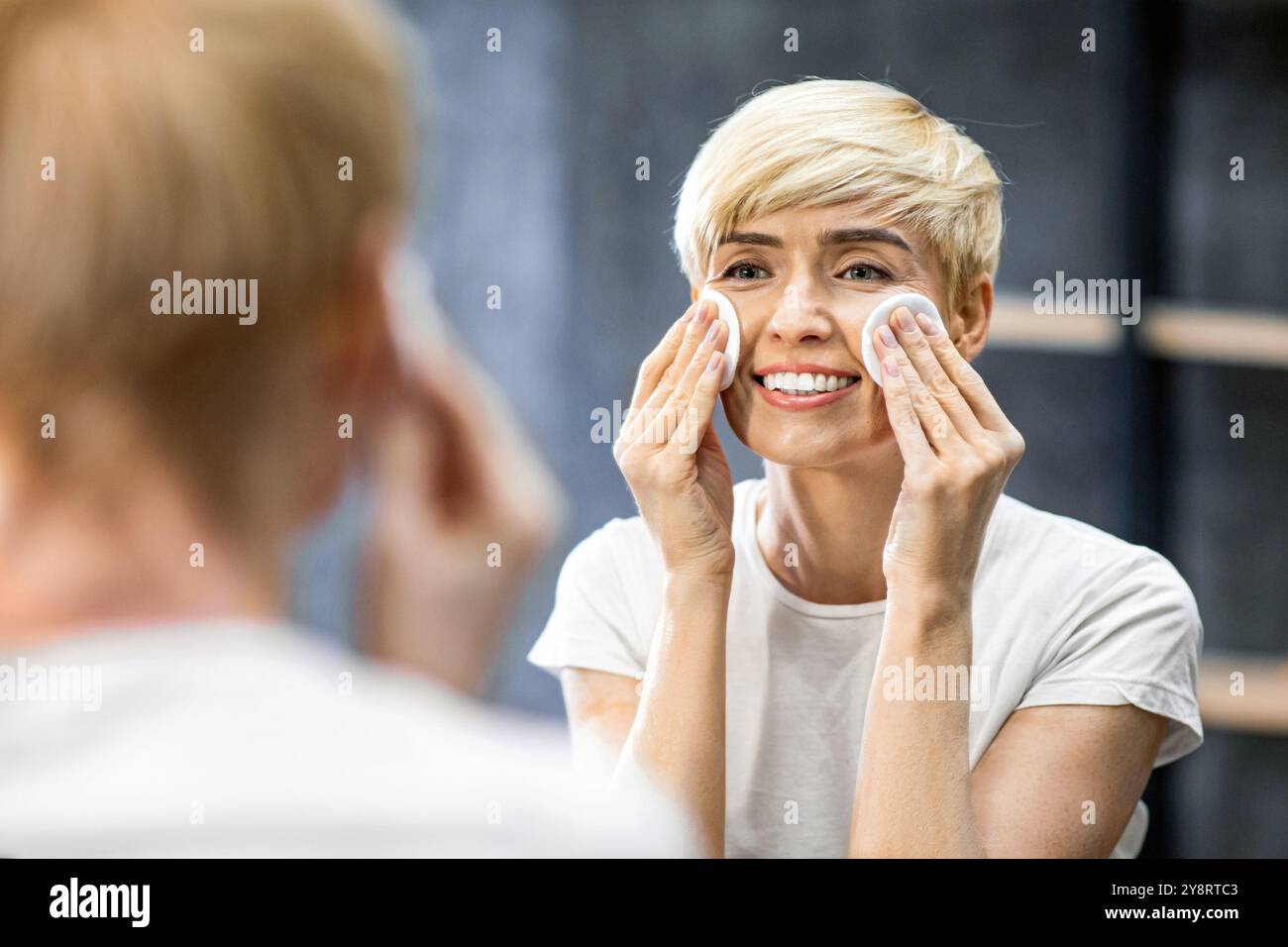 Model Using Pads Lady Using Cotton Pads Applying Makeup Remover Standing In Bathroom ...