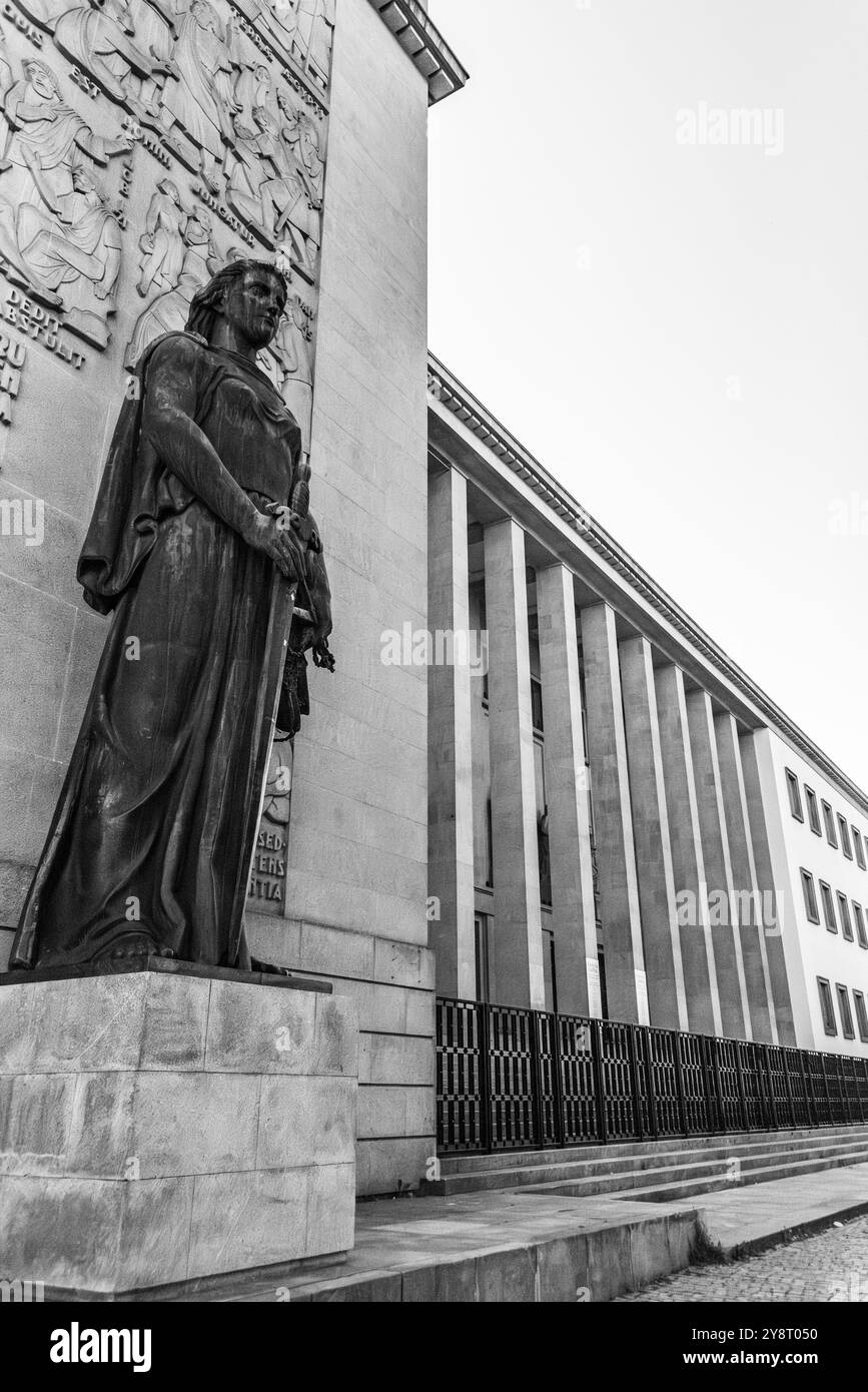 Justitia statue at the facade of the palace of justice with the labor ...