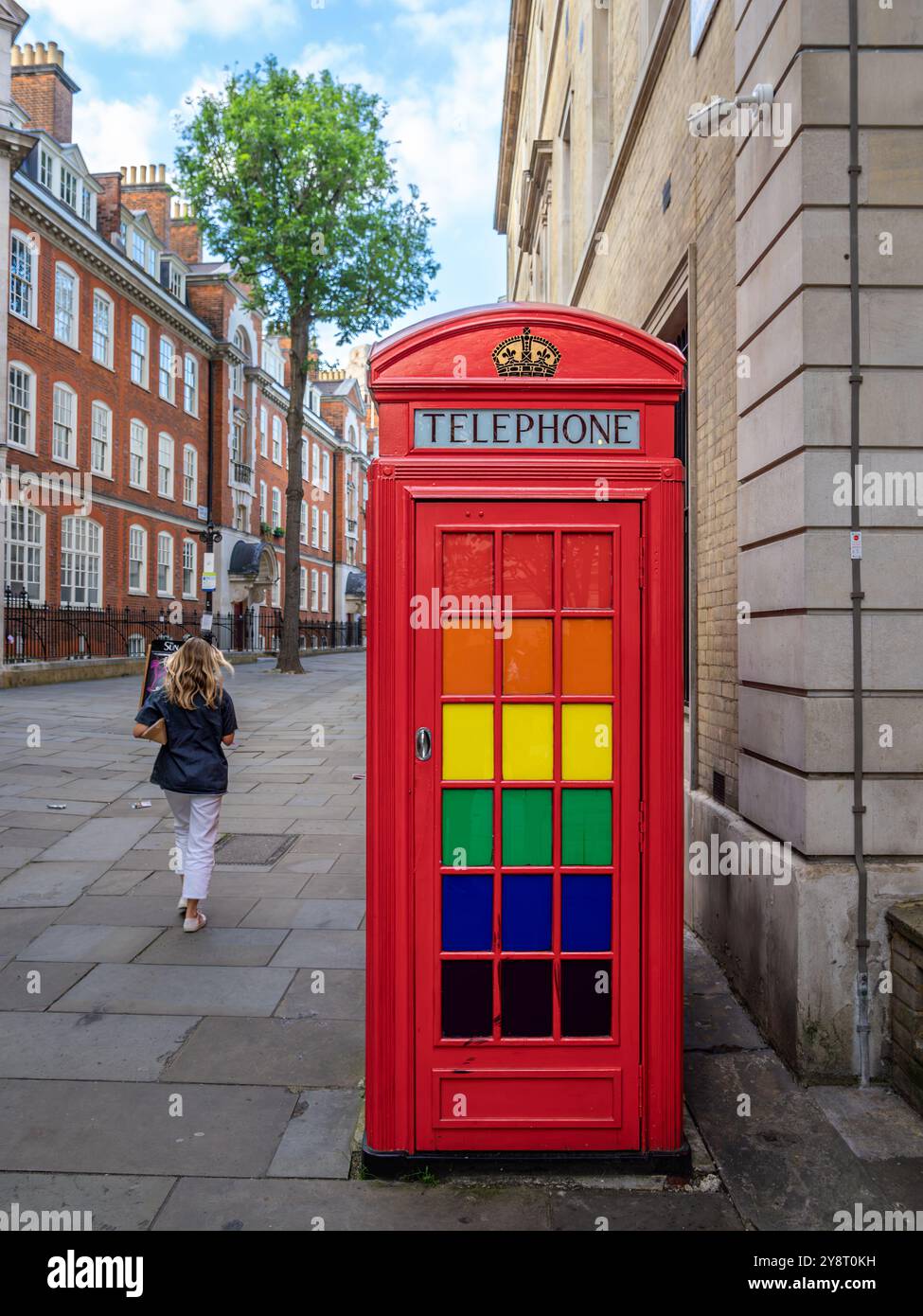 Row traditional telephone booths hi-res stock photography and images ...