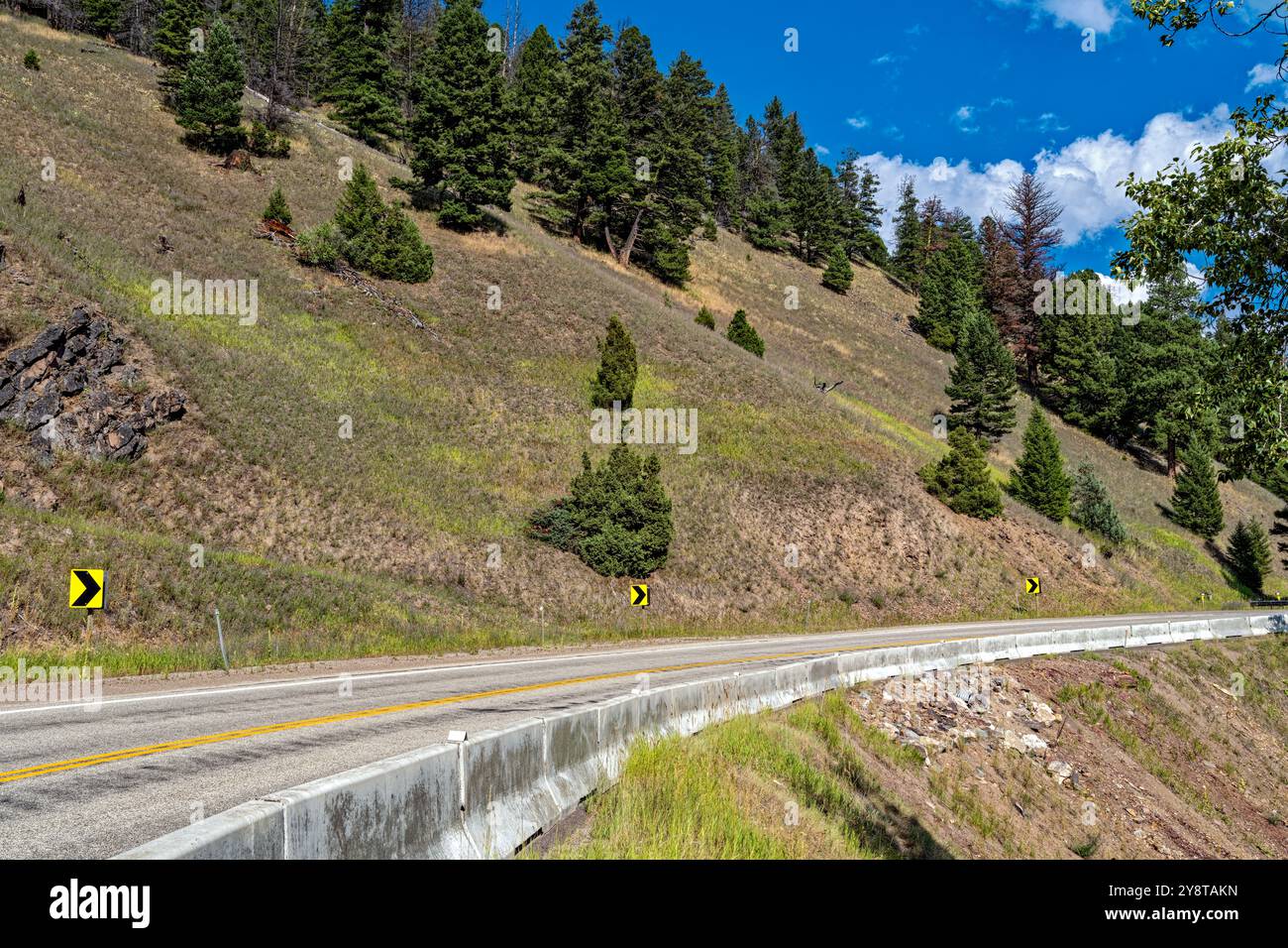 State Highway 1 curves along the mountainside near Philipsburg in Montana, USA Stock Photo