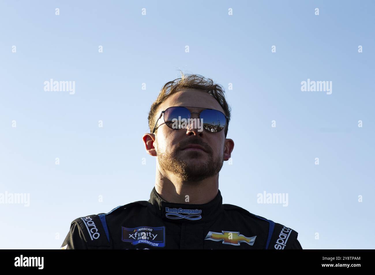 Daniel Hemric (10) stands for the National Anthem on pit road for the ...