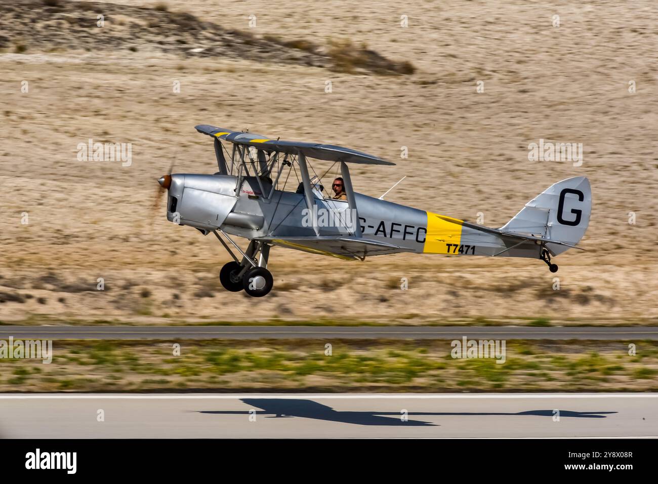 Biplane nostalgic vintage aircraft on display flight Stock Photo - Alamy