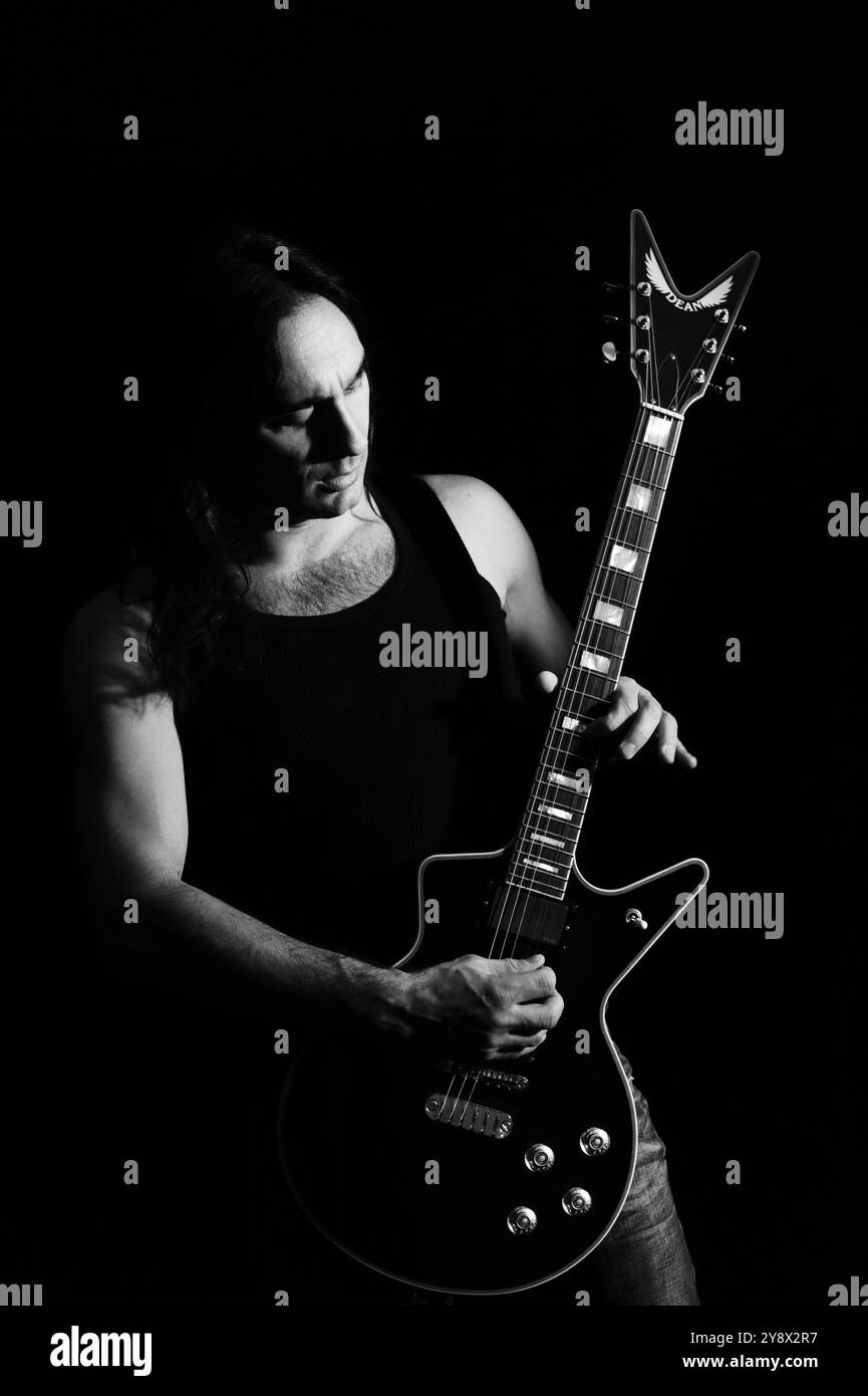 Milan Italy 02/04/2009:Tommy Massara, guitarist of the Italian metal band Extrema, during a portrait photo shoot in the photography studio. Stock Photo