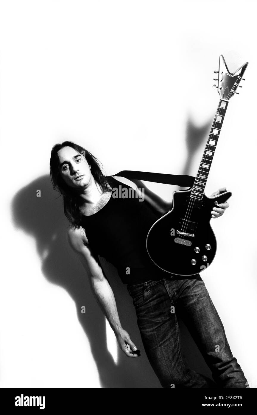 Milan Italy 02/04/2009:Tommy Massara, guitarist of the Italian metal band Extrema, during a portrait photo shoot in the photography studio. Stock Photo