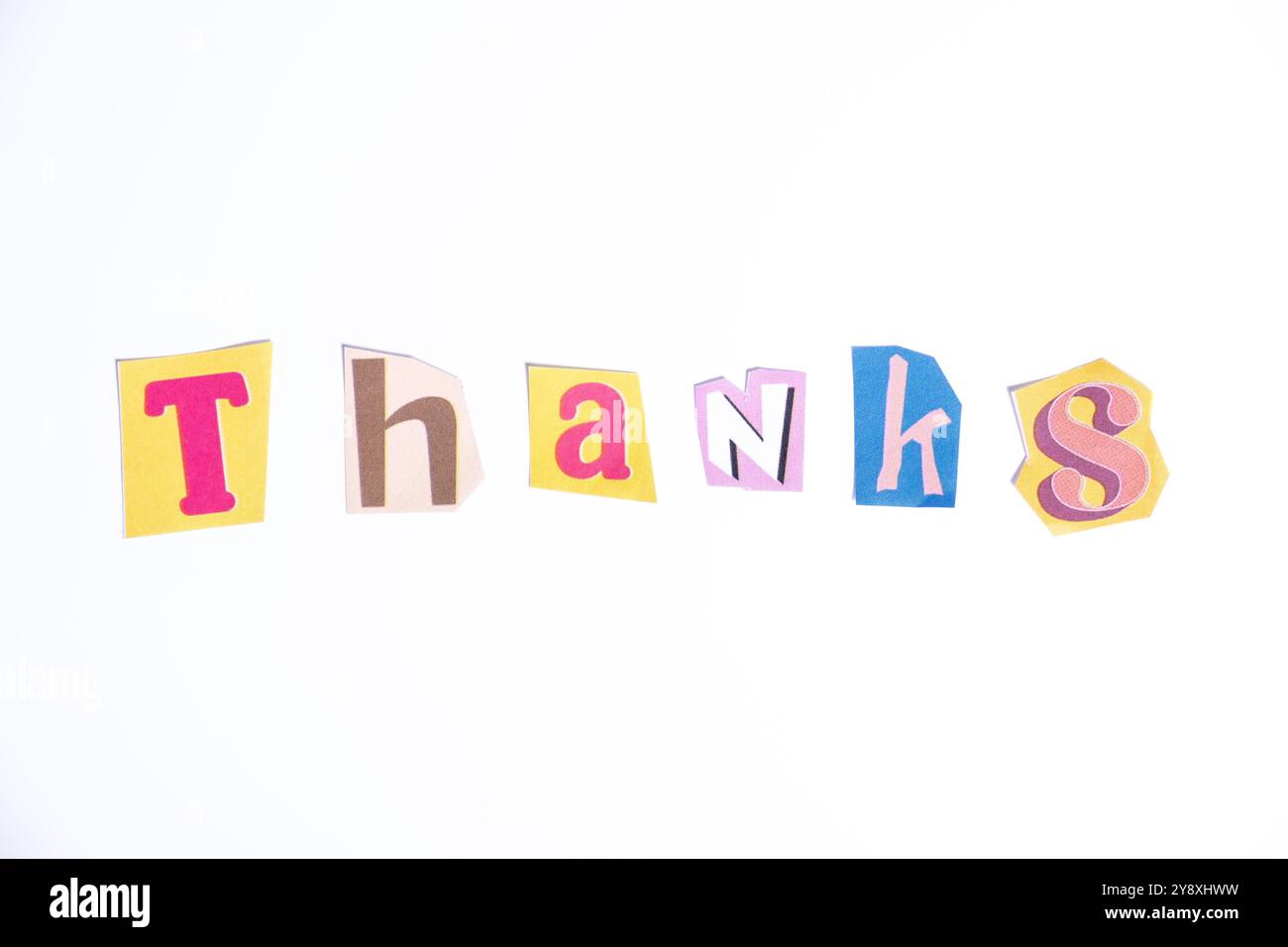 Thank you symbol. Fun cut out newspaper style typescript with word Thanks. Isolated on clean white background. Gratitude and Thank you concept. Stock Photo