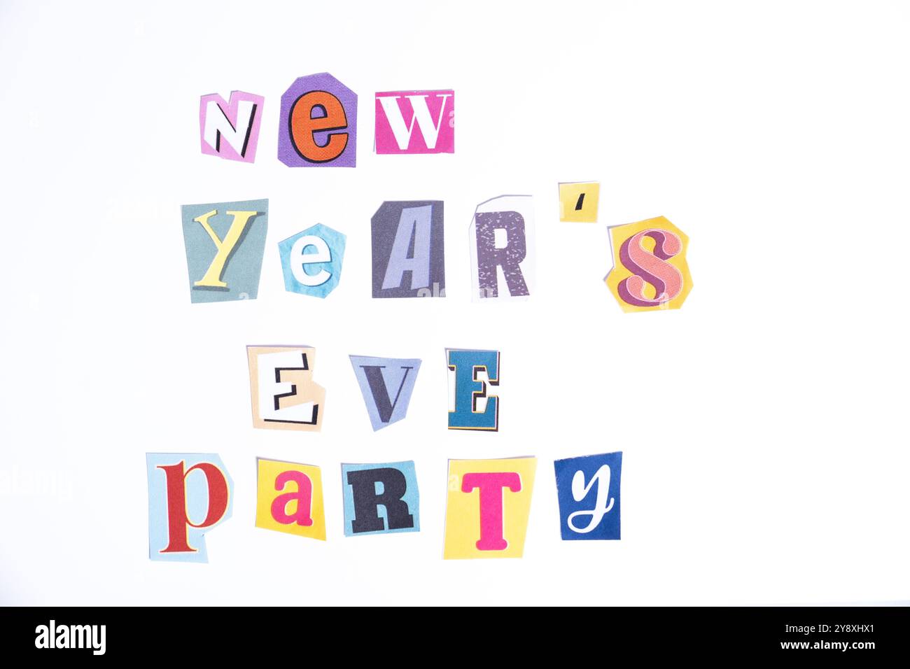 Phrase New Year's Eve Party spelled in cut out newspaper style typography, isolated on white background. Stock Photo