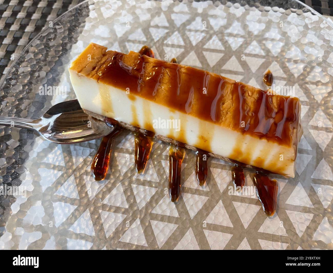 Cheese cake with toffee syrup. - Smartphone Captured Stock Image