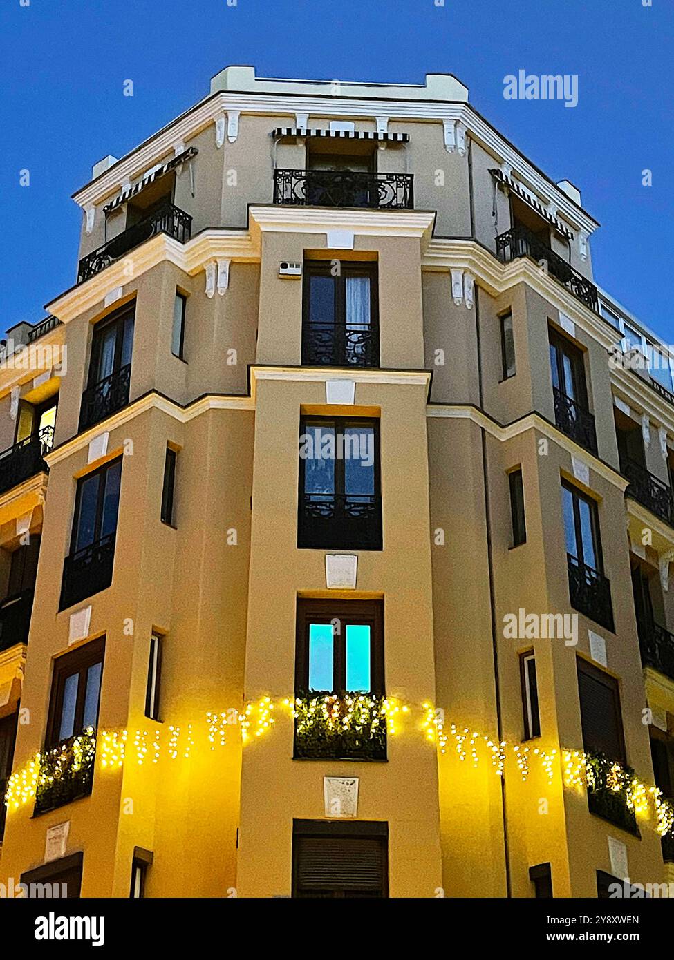 Facade of building in Christmas, night view. Madrid, Spain. - Smartphone Captured Stock Image