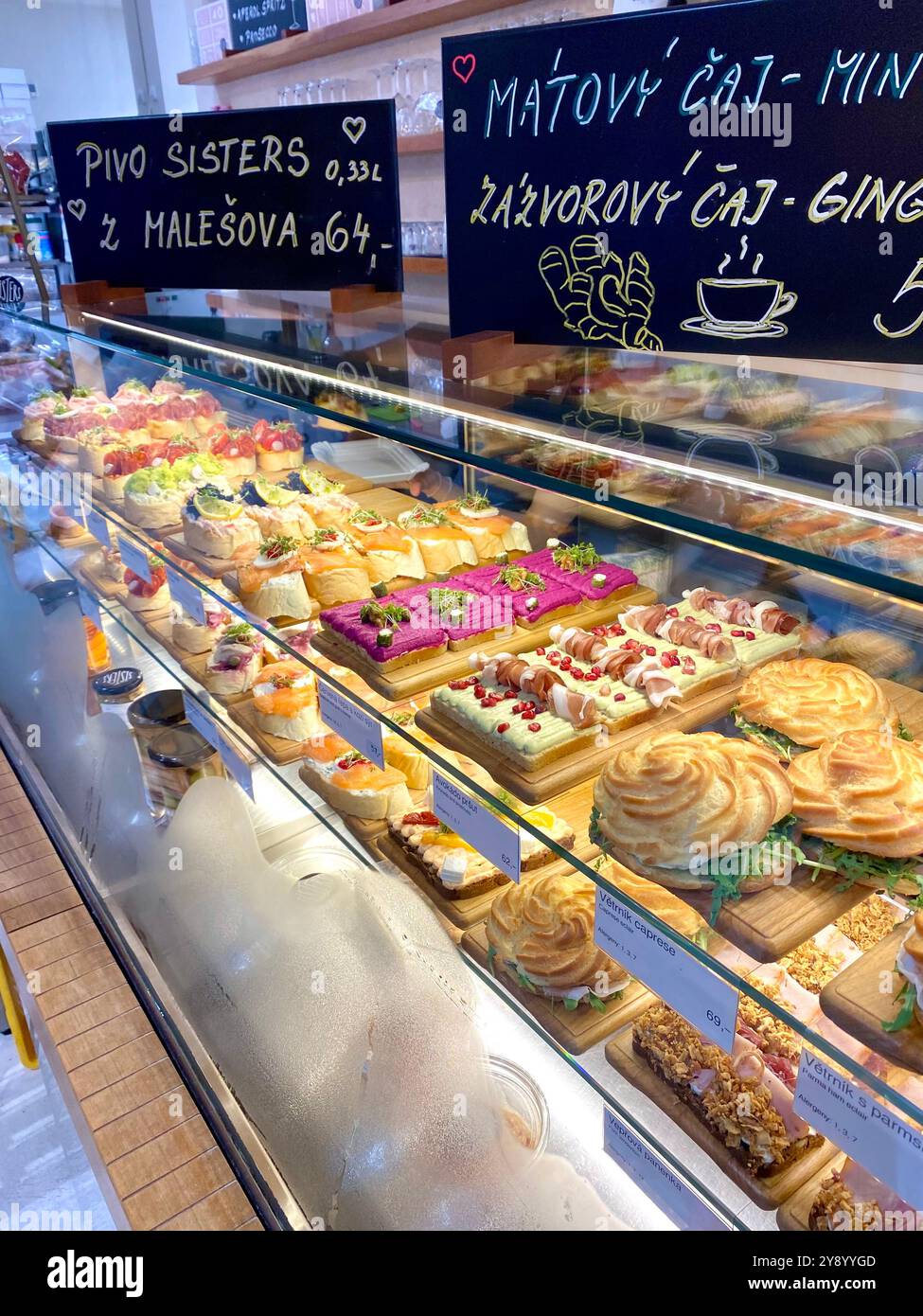 Czech open sandwich, Sisters bistro in Prague sells famous Czech open sandwiches with ham, cheese, beef and shrimp varieties, Czech Republic,2024 - Smartphone Captured Stock Image