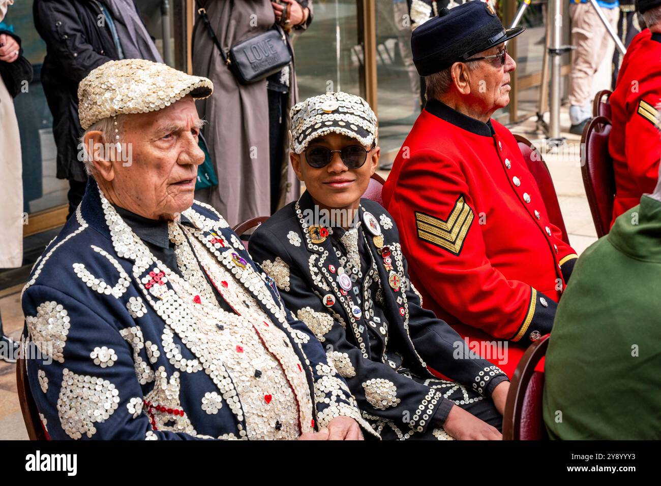 A Young Pearly Prince At The Pearly Kings and Queens Costermongers Harvest Festival, The Guildhall Yard, London, UK. Stock Photo