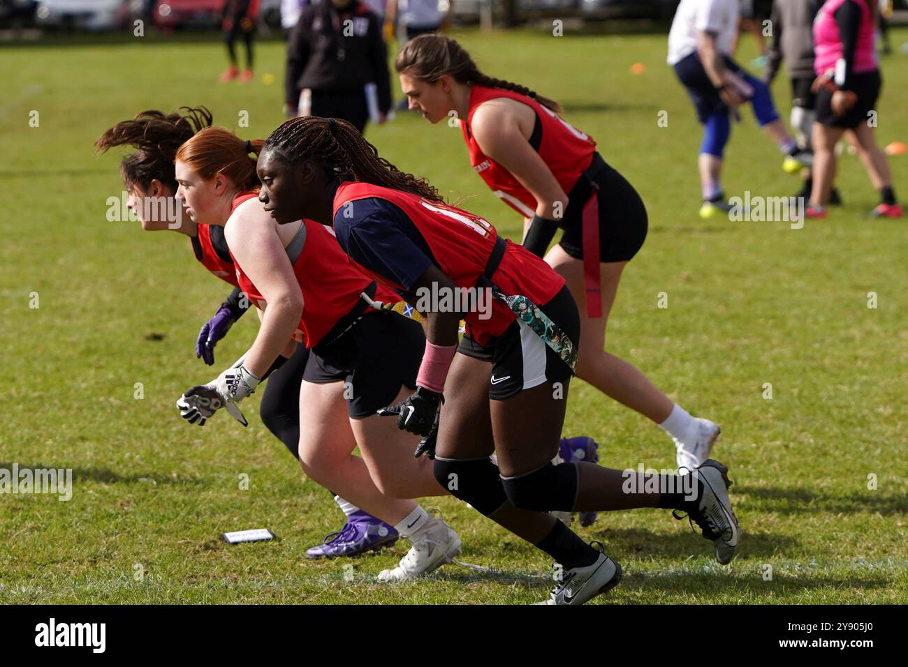 A female flag football offensive line in position at the Pantherbowl 2024 Stock Photo