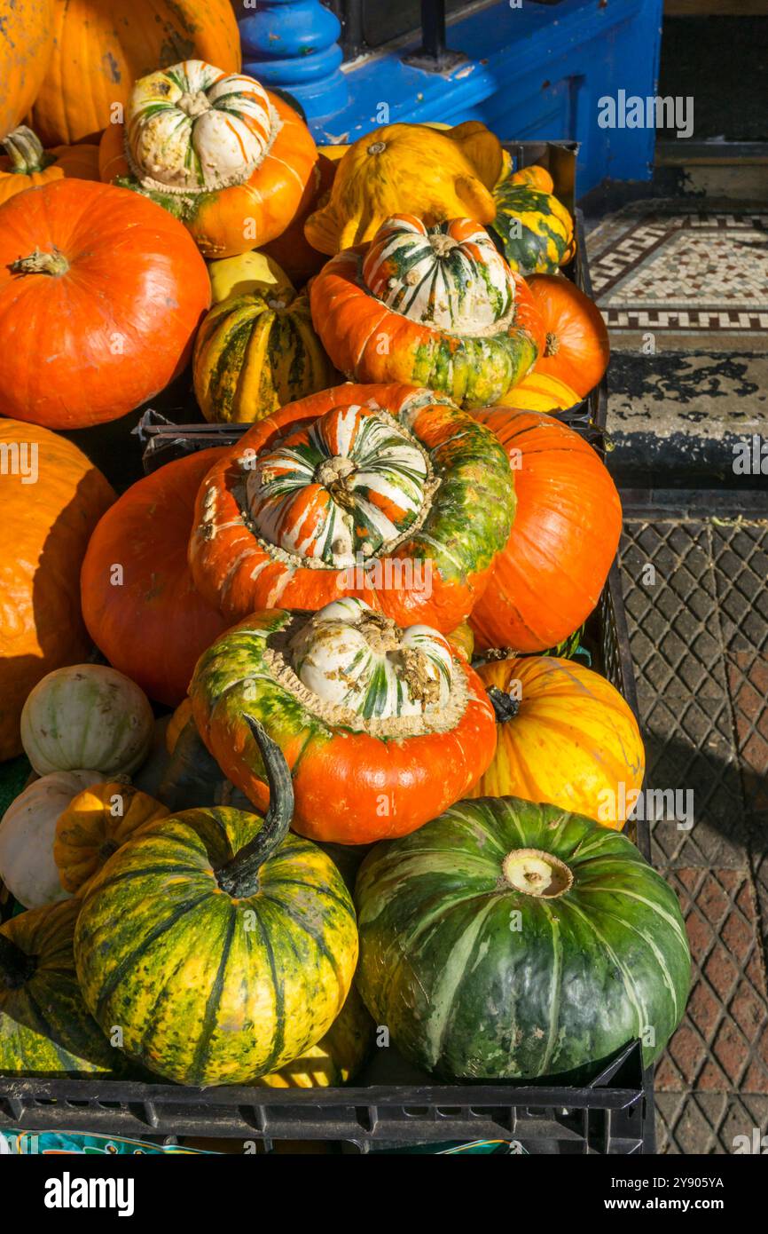 Turban Squash or Turk’s Turban Squash for sale outside a Norfolk greengrocer's shop. Stock Photo