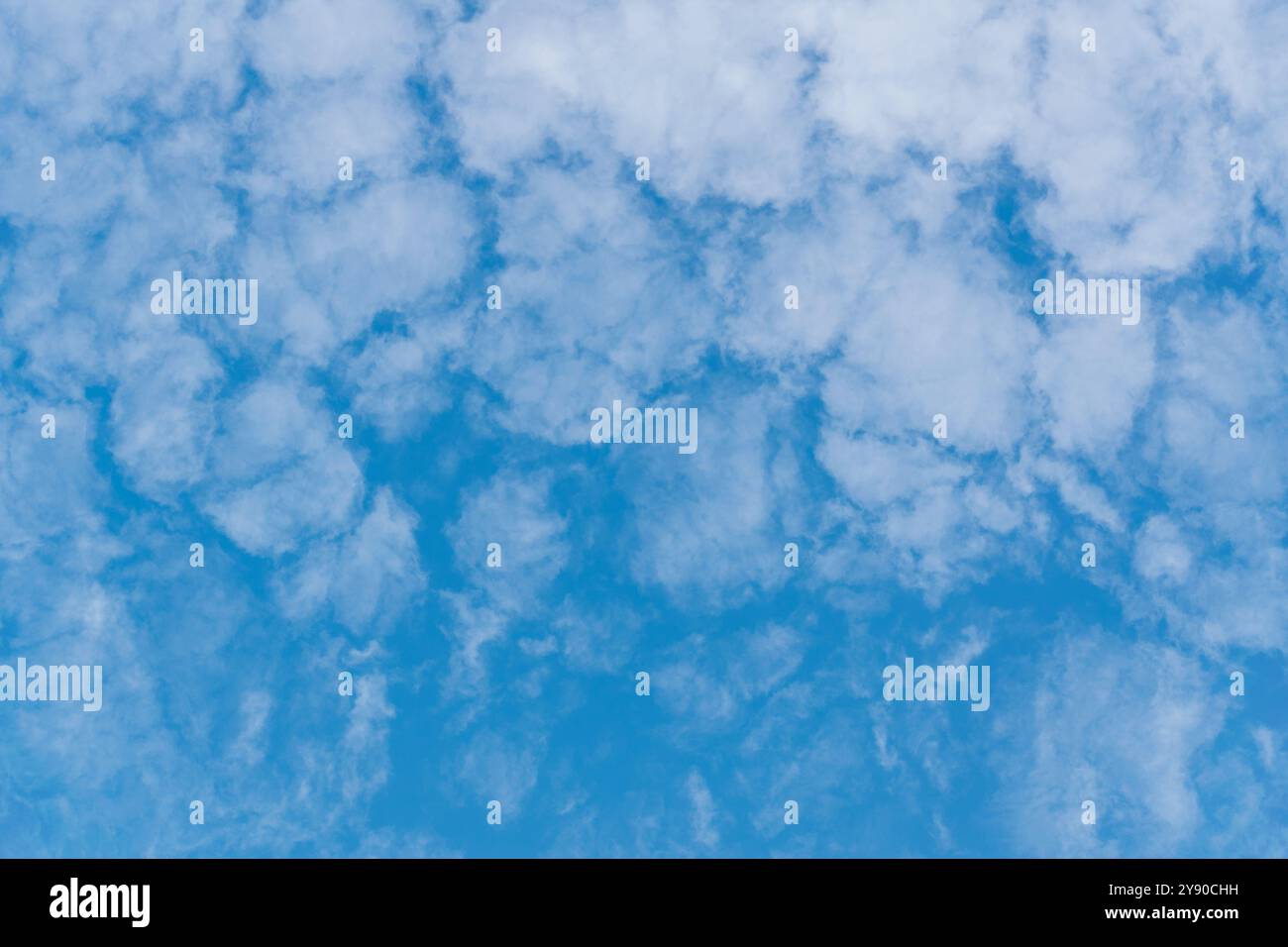 White cloud texture with blue background in hectagon pattern Stock Photo
