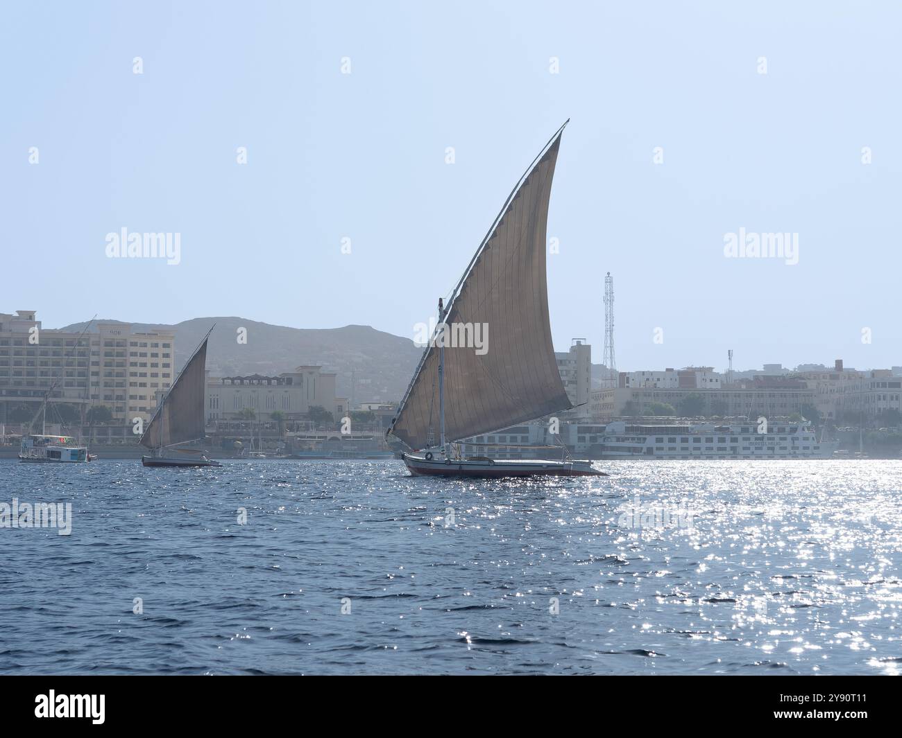 View of a felucca sailing down the great Nile River Egypt Stock Photo ...