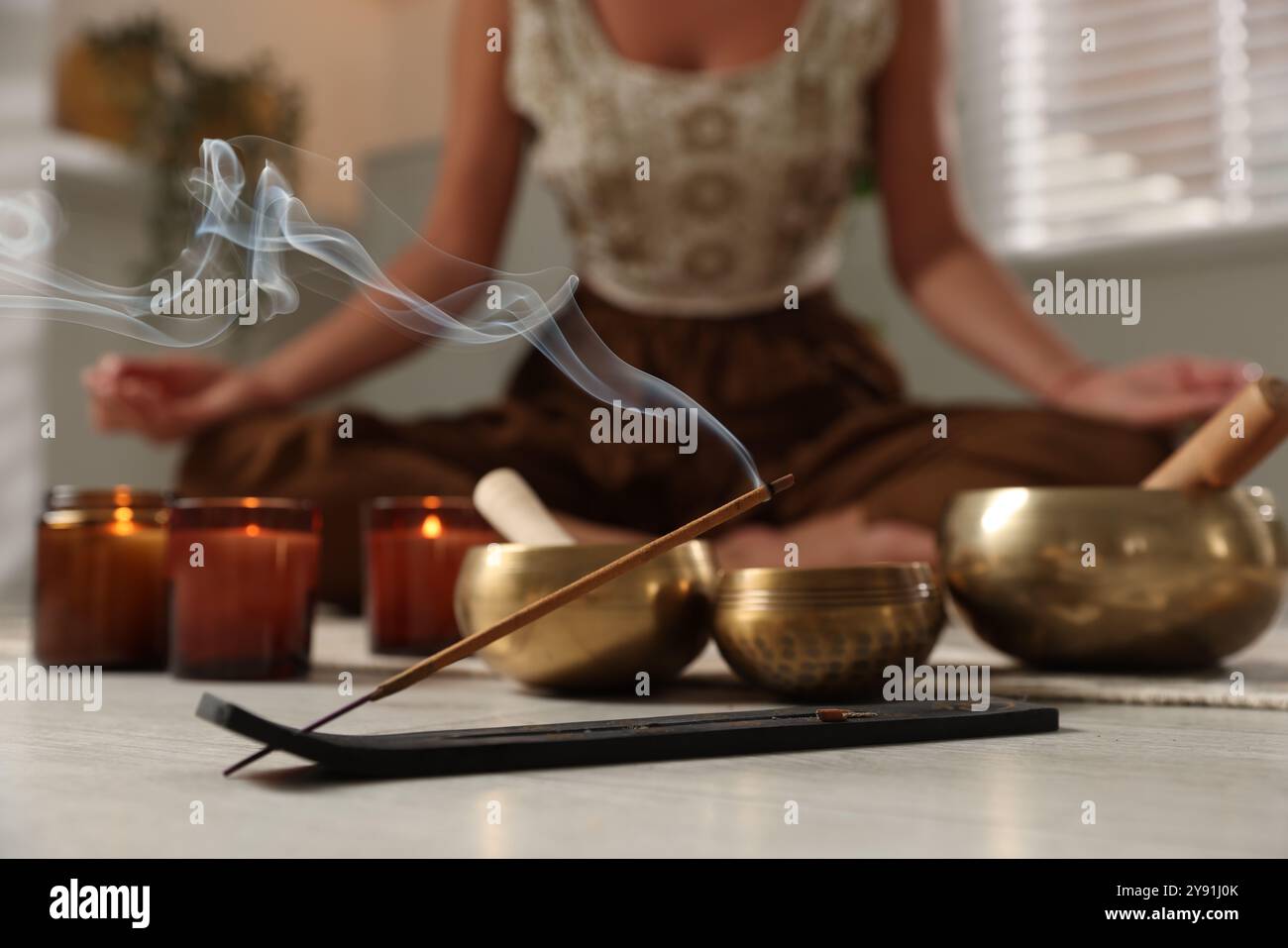 Young chinese woman burning incense hi-res stock photography and images ...