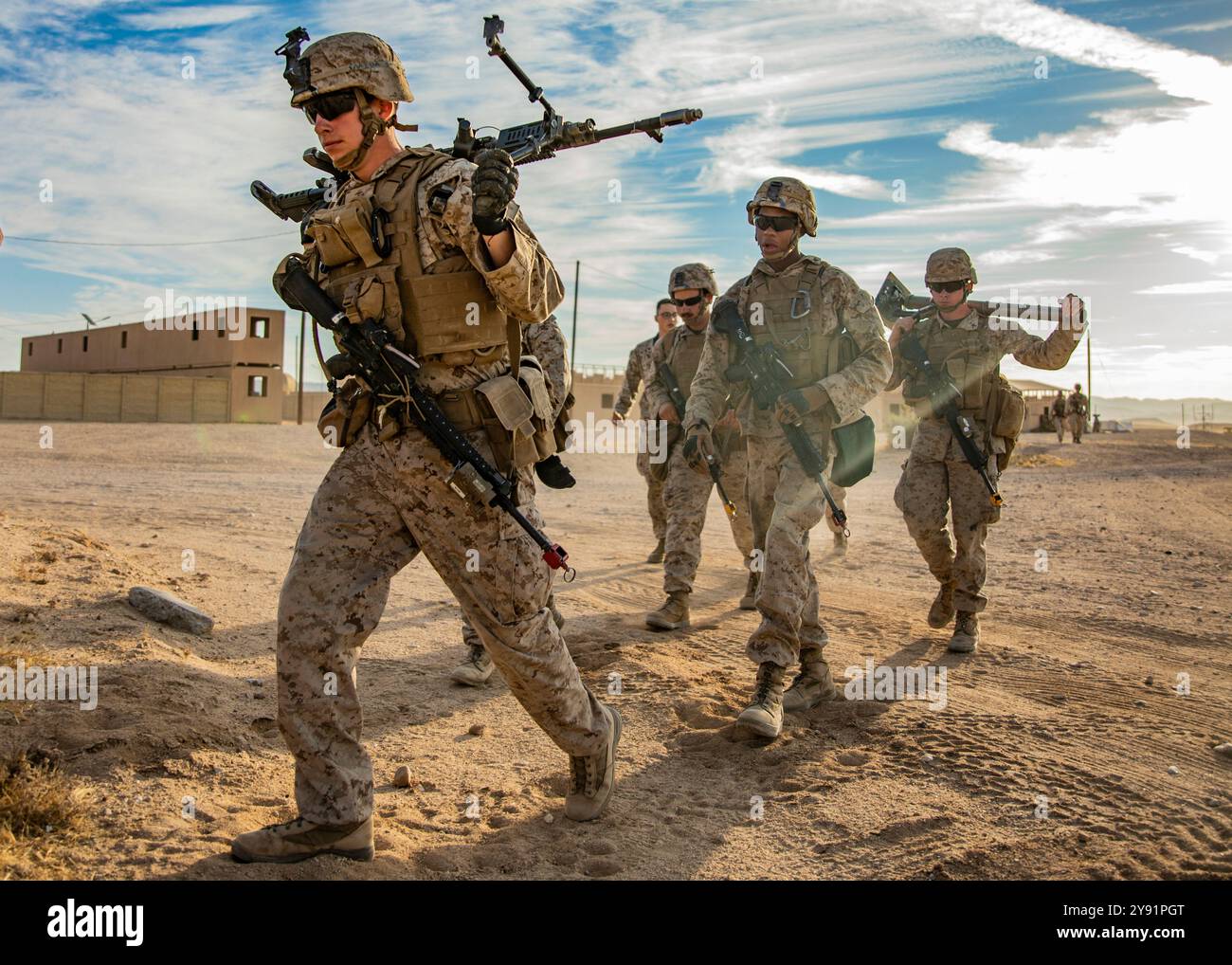 U.S. Marines with 1st Battalion, 25th Marine Regiment, 4th Marine Division, hike to Range 220 during Integrated Training Exercise 5-19 at Marine Corps Stock Photo