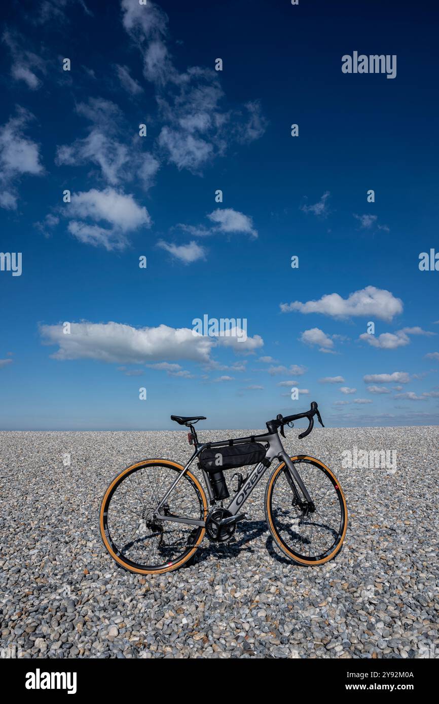 Orbea Gain electric road bike seen at Pointe du Hourdel, Somme, France. Stock Photo